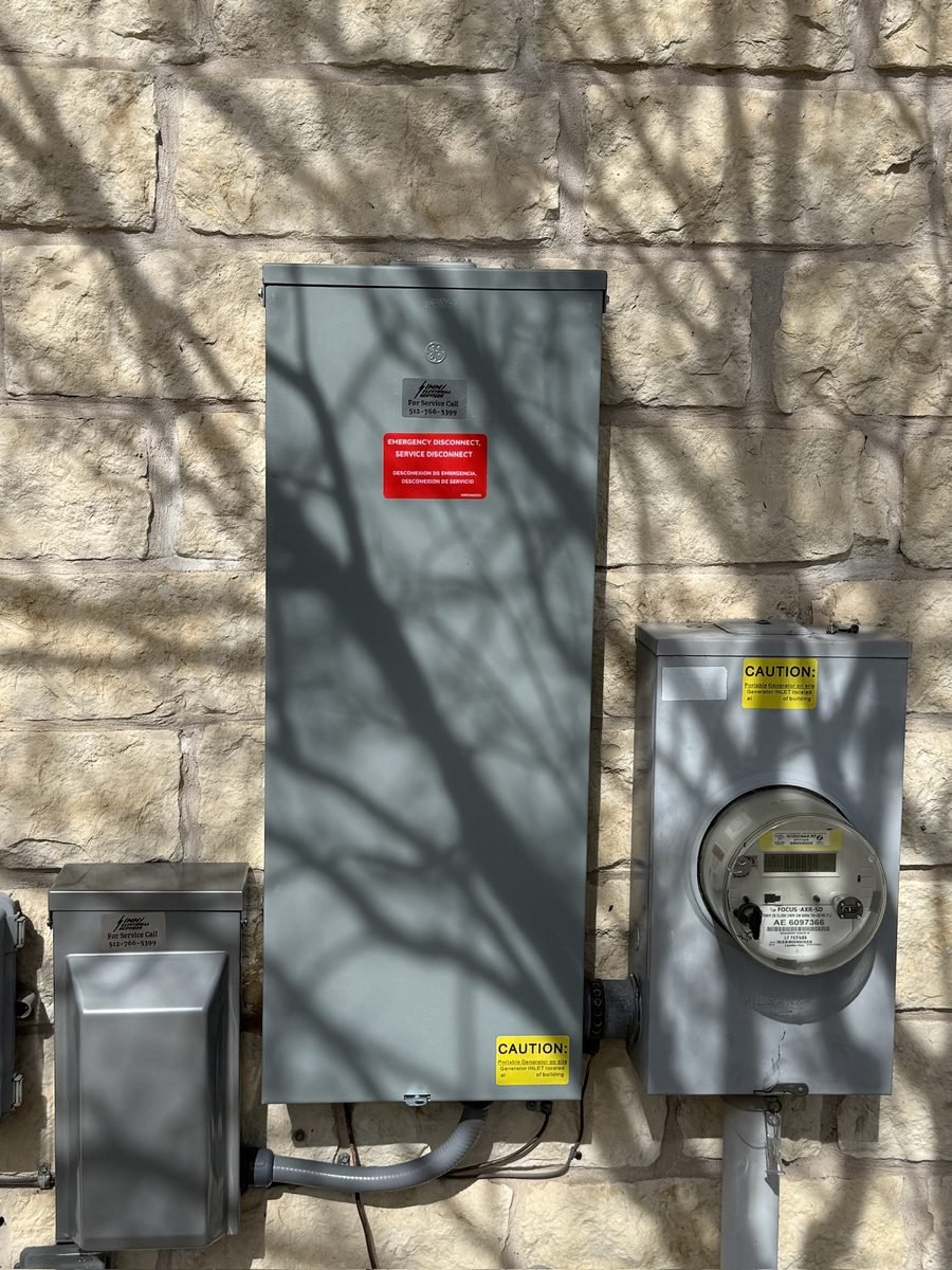 Residential electrical service upgrade with new service disconnect and meter installed by Simms Electrical Services in the Austin, TX area
