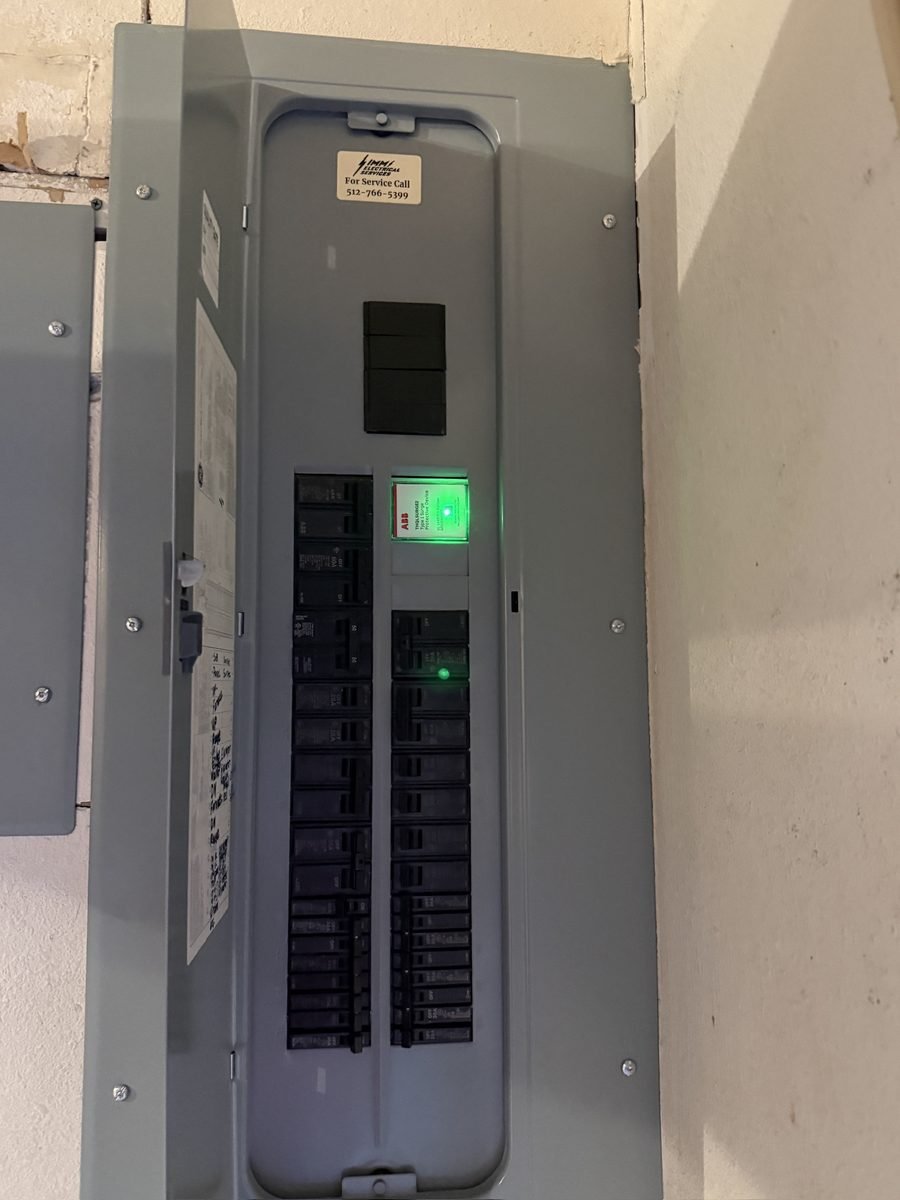 Whole-home surge protector (ABB Type 1 surge protective device) installed in an electrical panel by Simms Electrical Services in the Austin, TX area